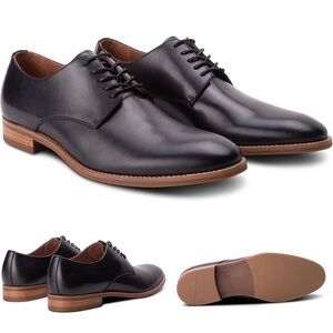 Classic Black Leather Derby Shoes with Contrasting Tan Sole